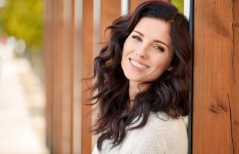 beautiful smiling woman in the park
